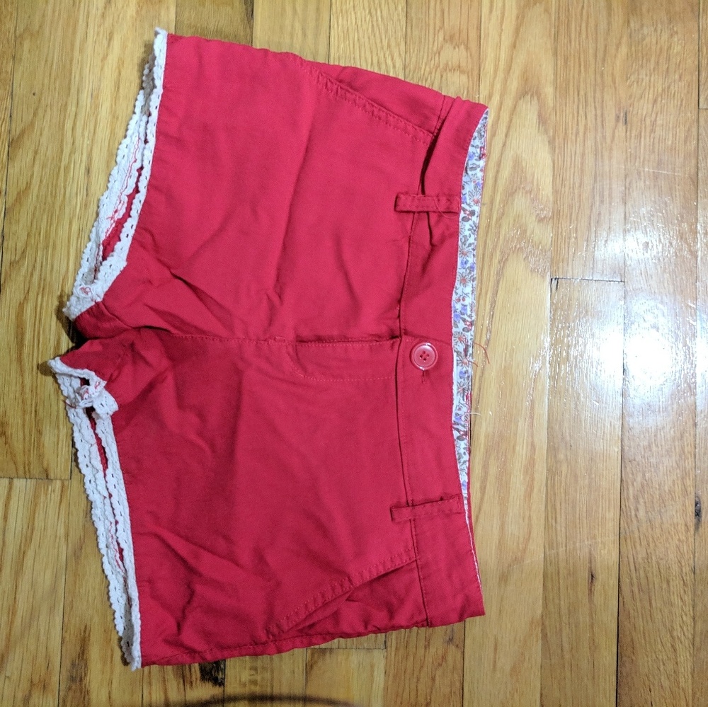 Red Shorts with Lace Detail on Edge